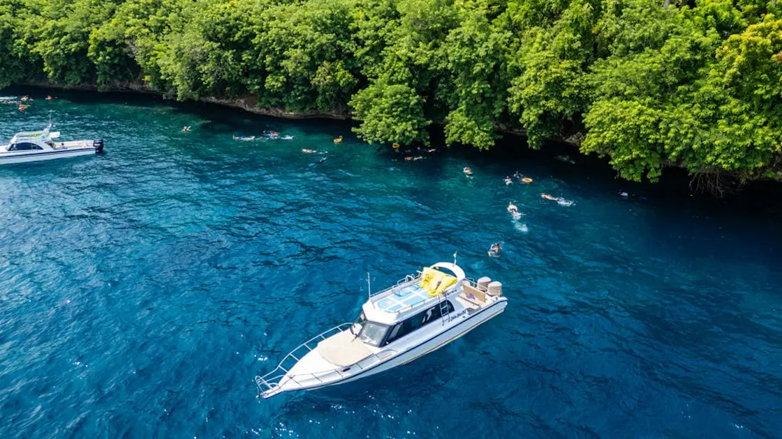 Snorkeling in crystal clear waters of Nusa Penida